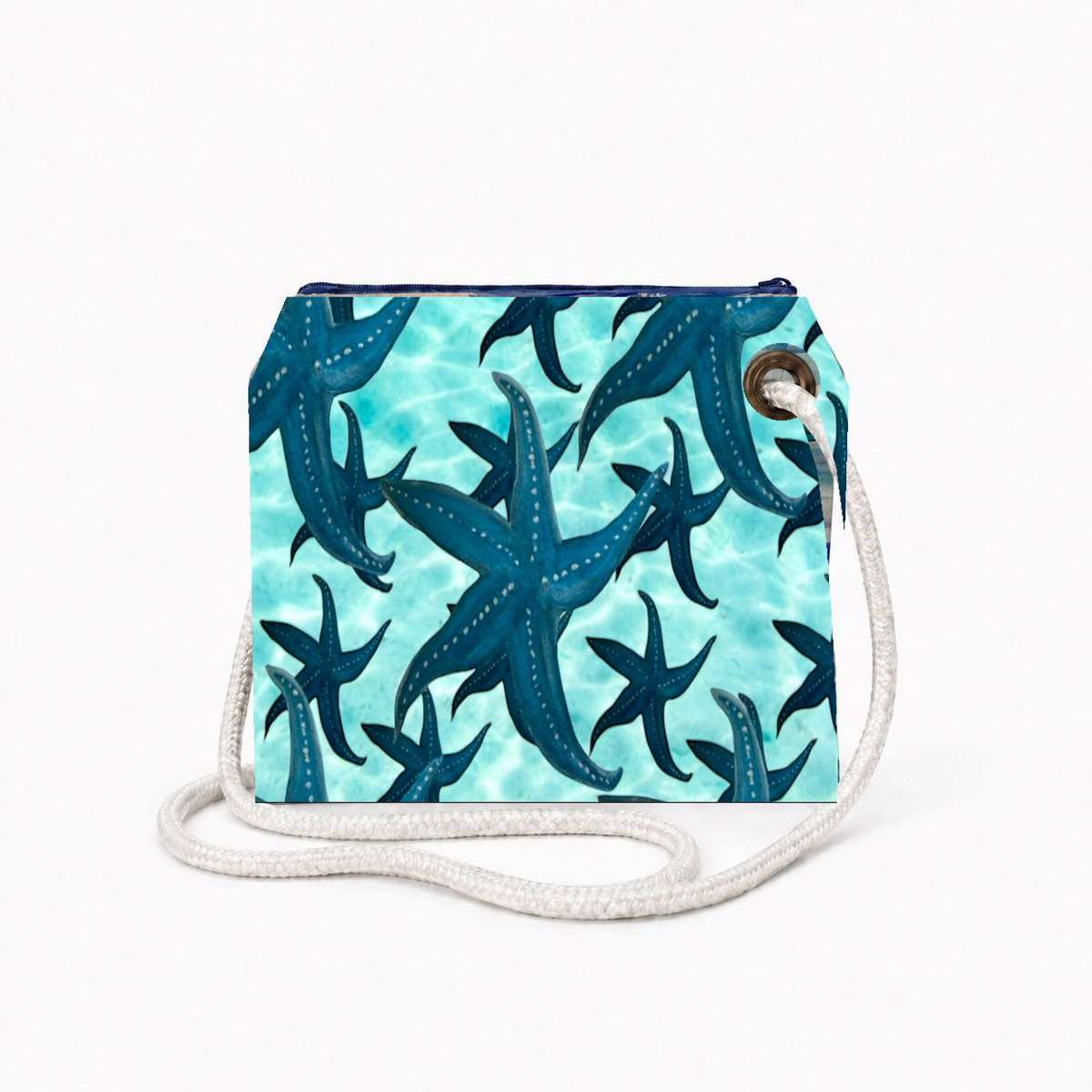 Lots of Starfish crossbody recycled sail bag with zipper and white rope strap
