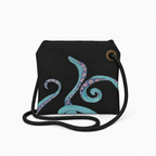 Octavia Crossbody recycled sail bag back with original octopus artwork