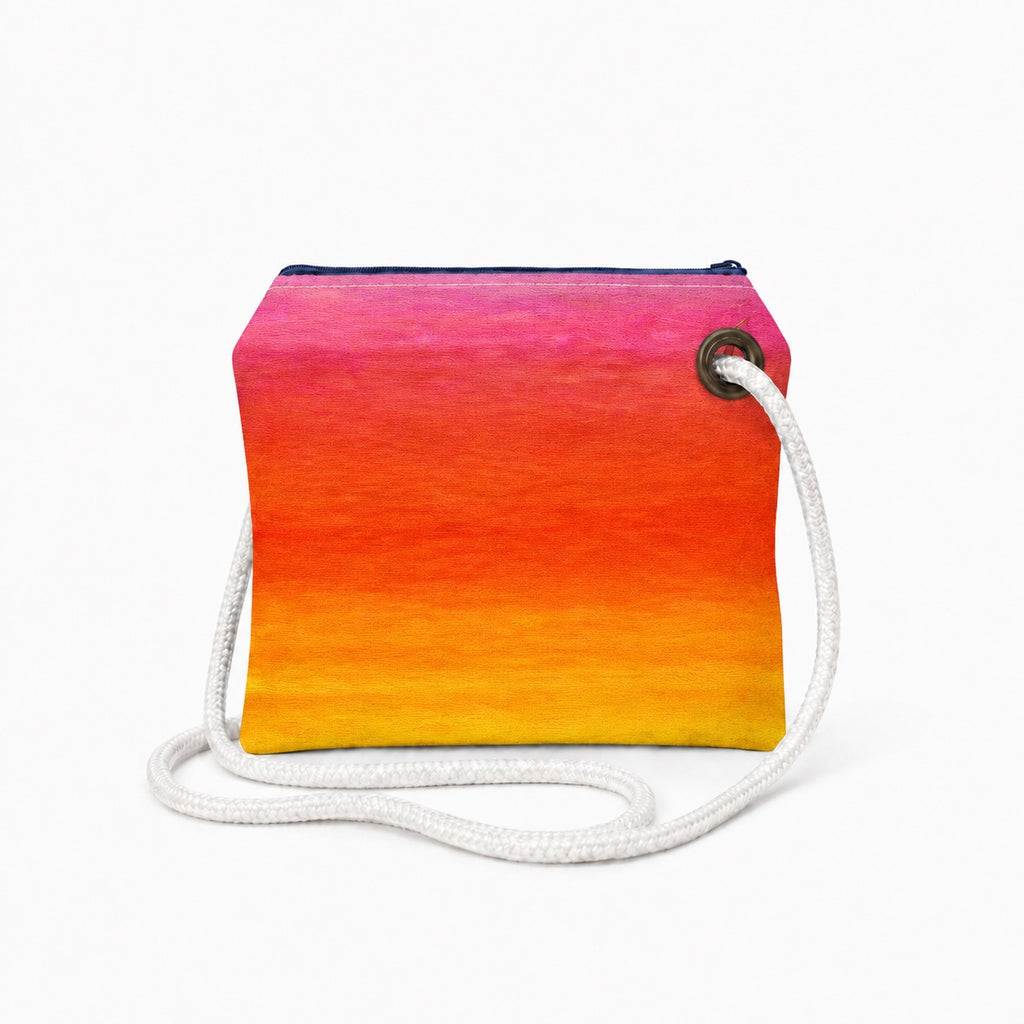 Sunset crossbody recycled sail bag with zipper closure